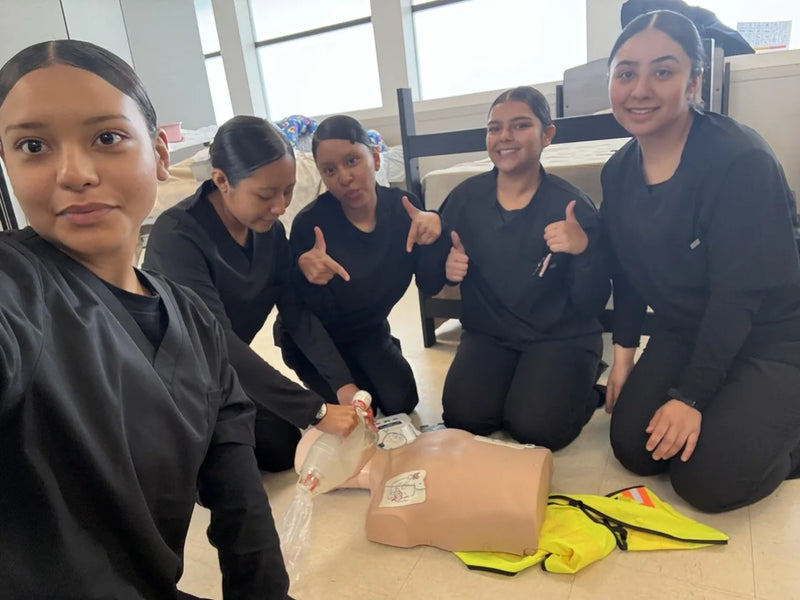 LGL College students practicing CPR in the skills lab